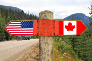 Signpost to US and Canada